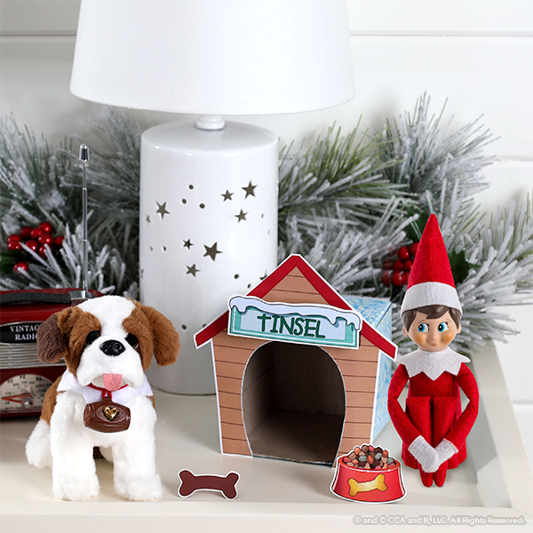 Dog house printable on display with dog and elf