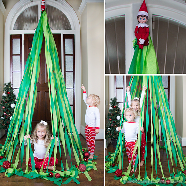 kids with streamer christmas tree