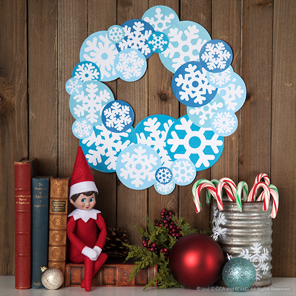 elf with paper wreath