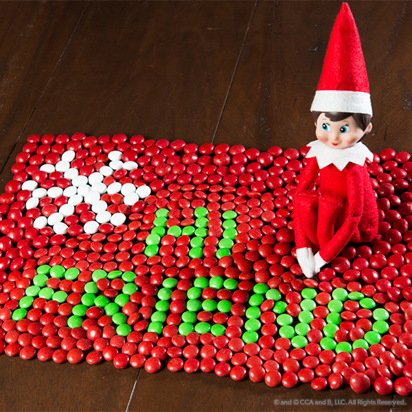 Elf with a message made of candy