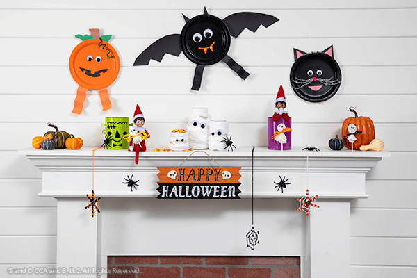 All Halloween crafts with elf on mantle