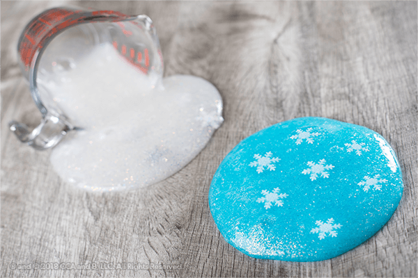 Finished glitter slime craft with snowflakes