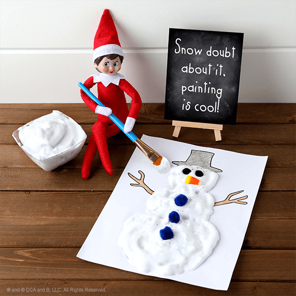 Elf with snow paint snowman picture