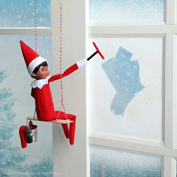 Elf wiping a window