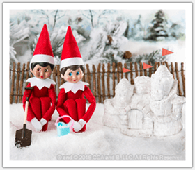 Scout Elves making a sand castle out of snow
