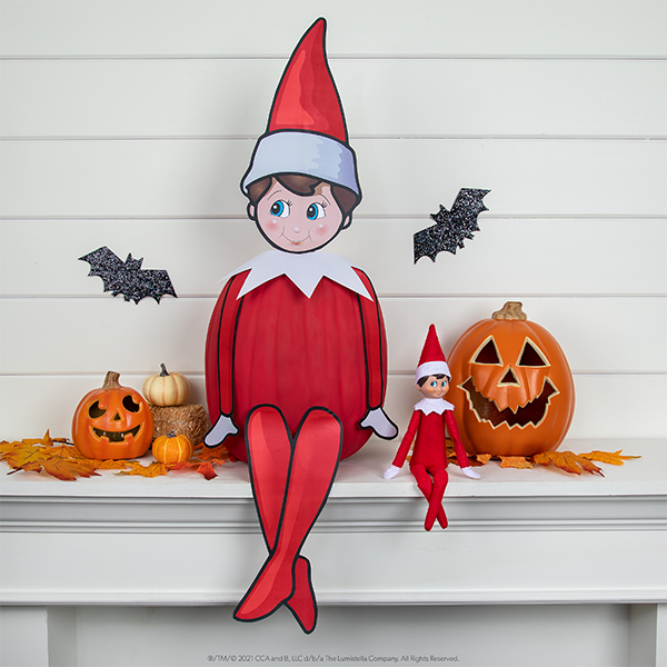 Elf created with elf printable and painted red pumpkin body