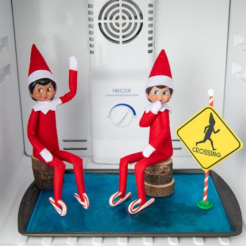 Elves in fridge with ice tray, peppermint skates and printable sign. 