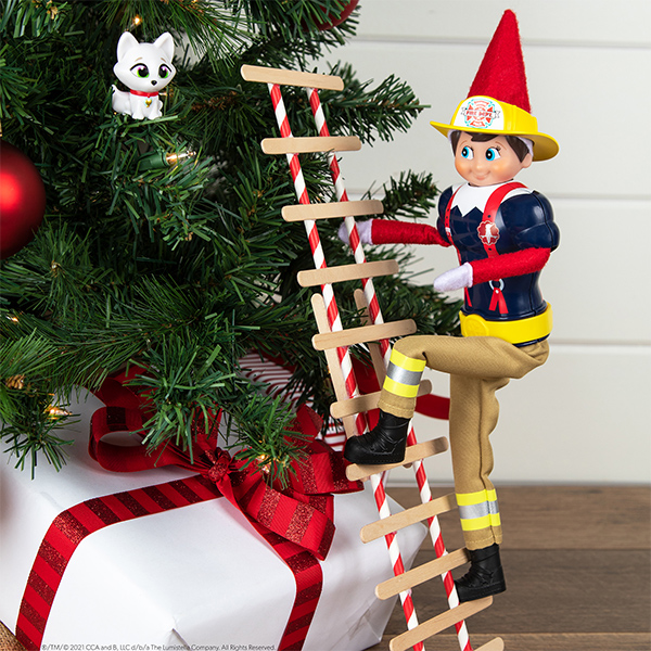 Elf in fireman outfit saving an Arctic Fox mini from a tree