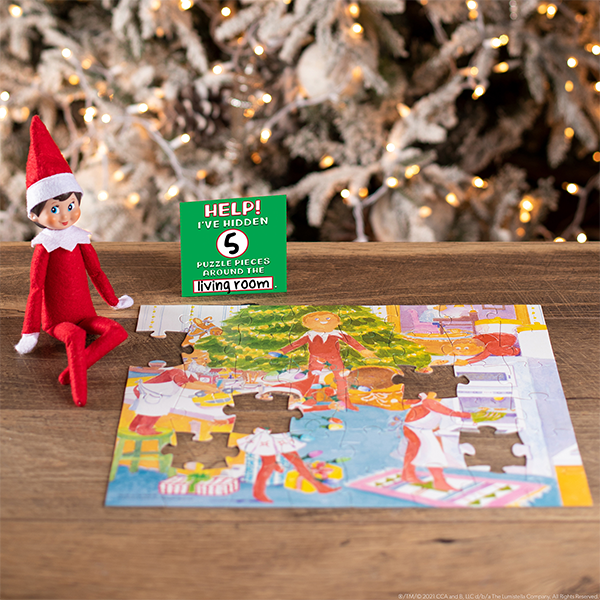Elf sitting with puzzle and printable note