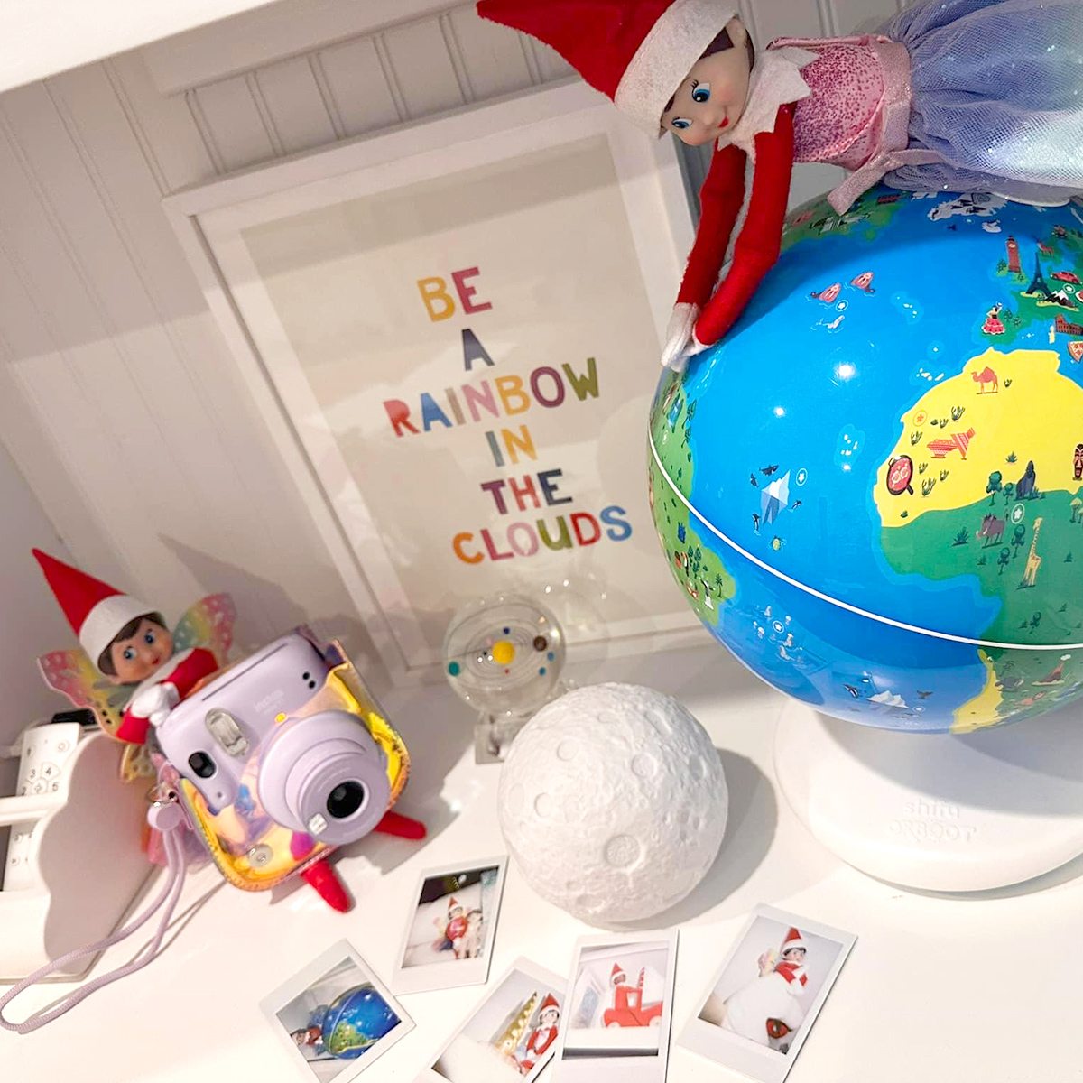 Scout Elf flying over a glob while another Scout Elf takes a picture
