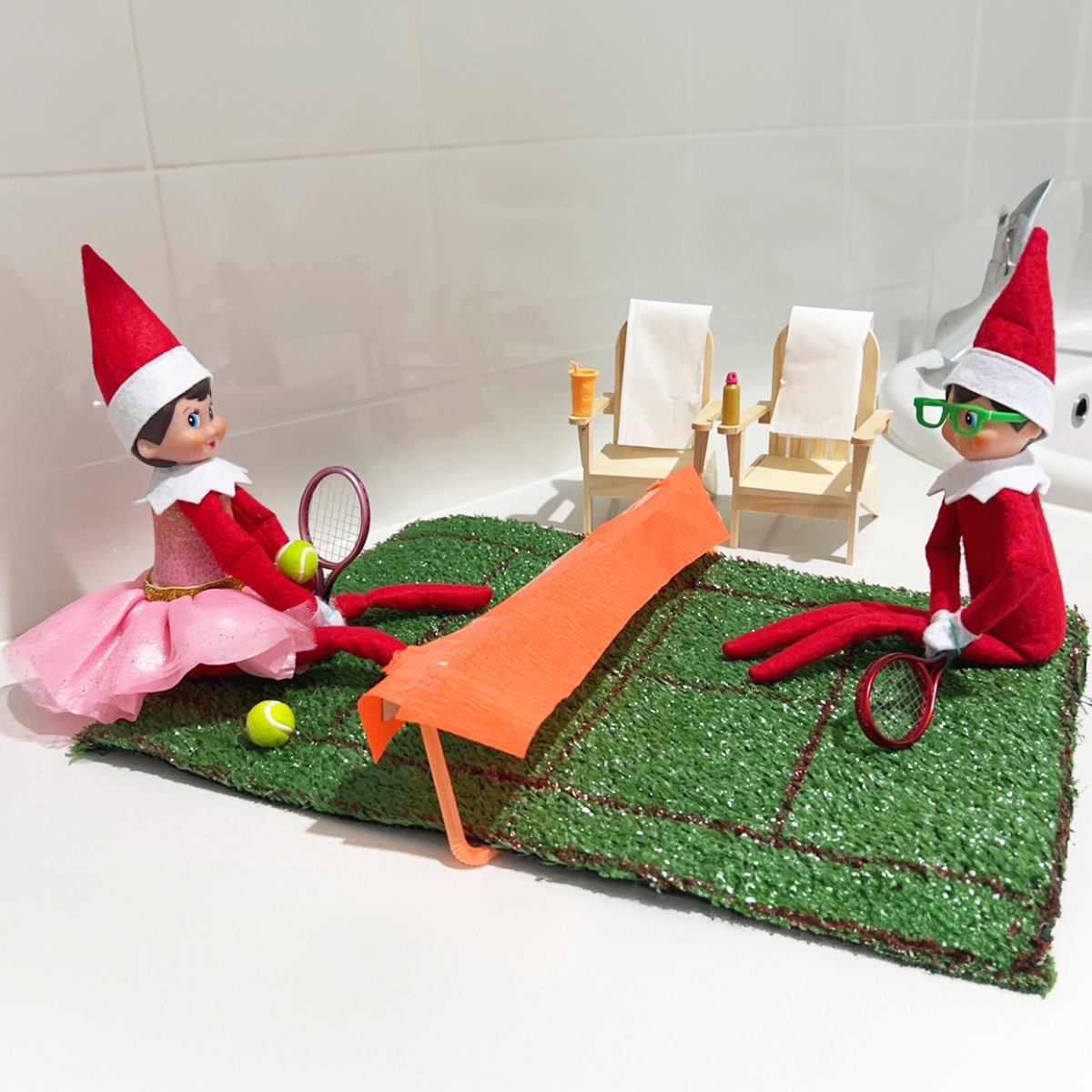 Two Scout Elves playing tennis