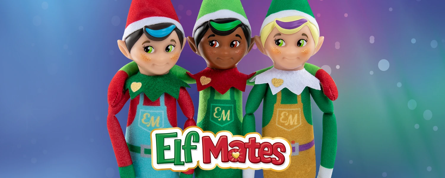 Elf Mates Chef, Cobbler and Toy Maker posing together. The Elf Mates Cobbler has his arms around the Elf Mates Chef and Elf Mates Toy Maker.