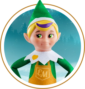 The Elf Mates® Toy Maker is posing in a circle with a teal winter landscape in the background. The background is framed with another gold stroke circle.