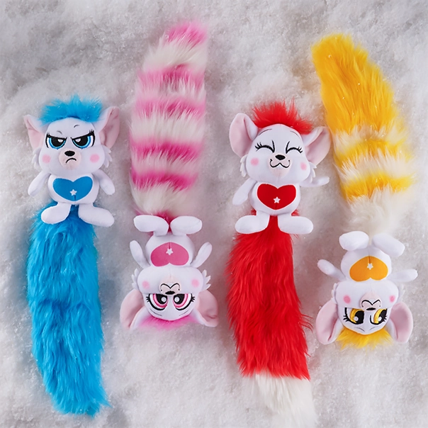 A group shot of the 4 Bogie™ plush options, posing in a snowy landscape.