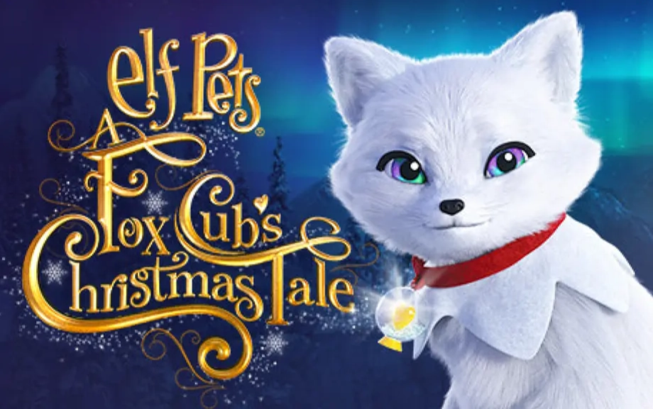 Elf Pets®: A Fox Cub's Christmas Tale cover art. An Elf Pets Arctic Fox cub is in the right-hand corner with the film's branding on the left, reading "Elf Pets® A Fox Cub's Christmas Tale". In the background is a snowy landscape with conifer trees and a snow-capped mountain range.