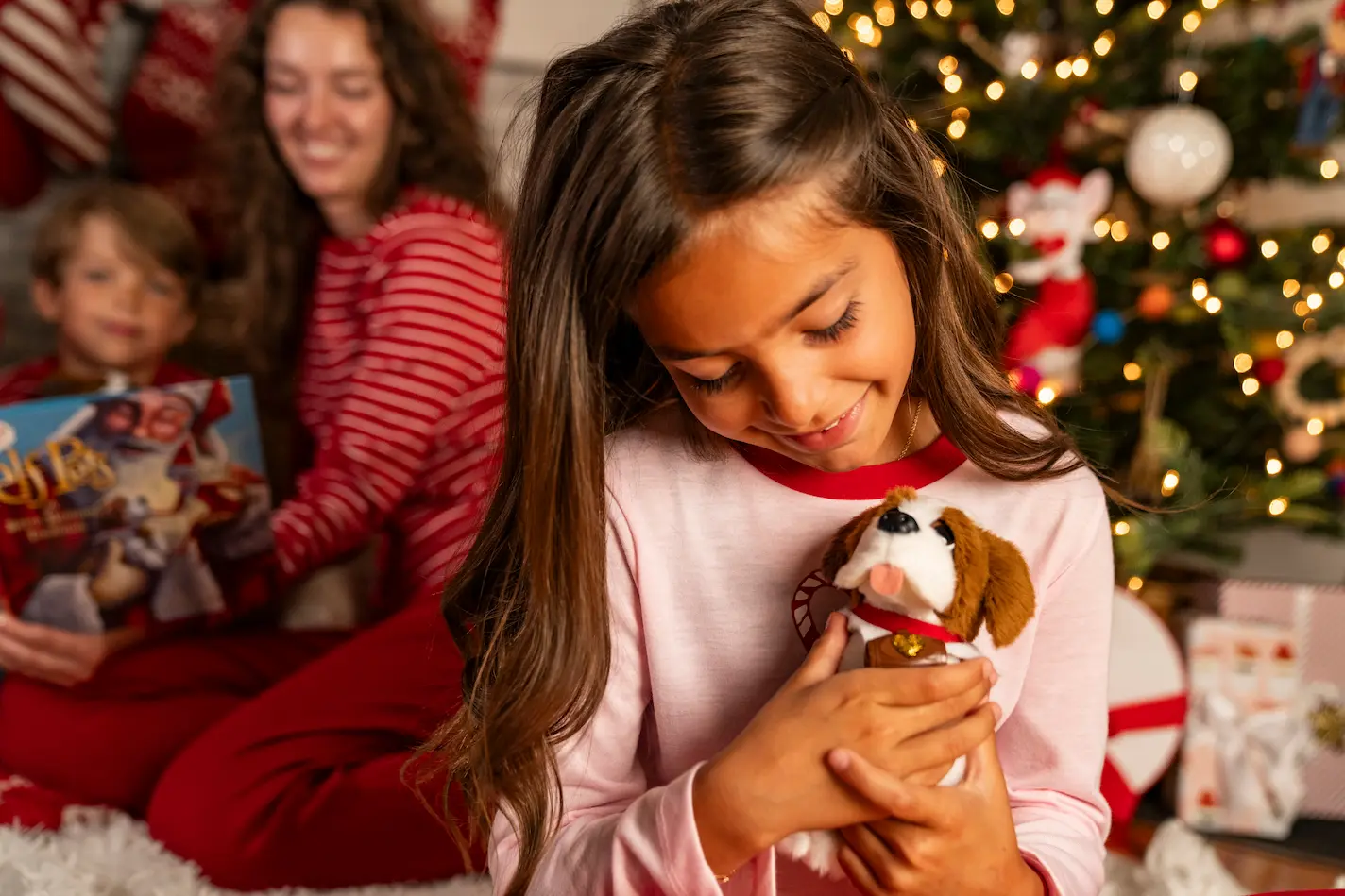 A girl cuddle with an Elf Pets Plush 