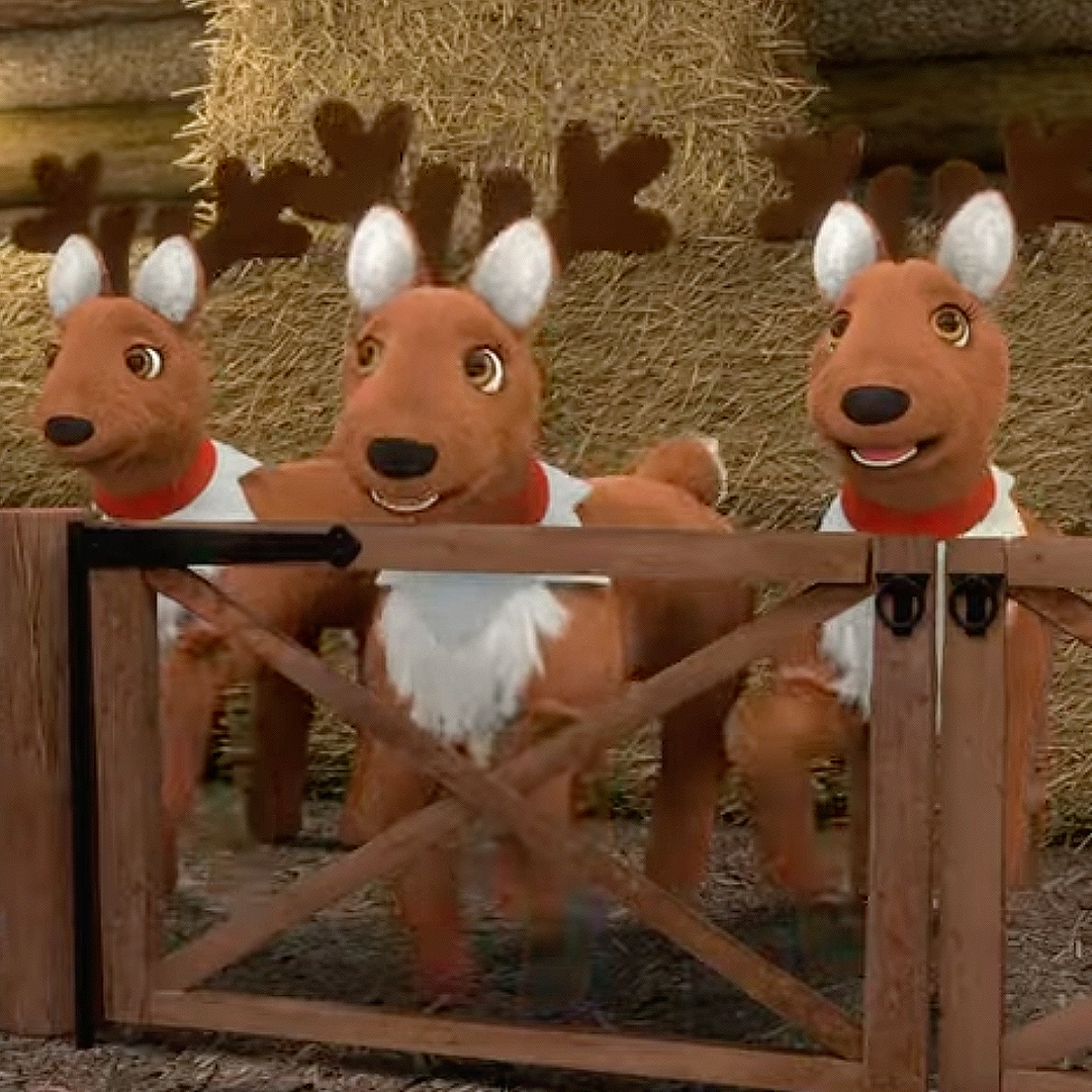 A trio of Elf Pets Reindeer in a stable at the North Pole. This is a still from the "Elf Pets: Santa's Reindeer Rescue" animated special, particularly from the trailer on YouTube.