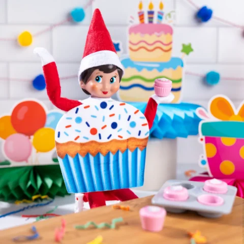 The Elf on the Shelf wearing a cupcake costume