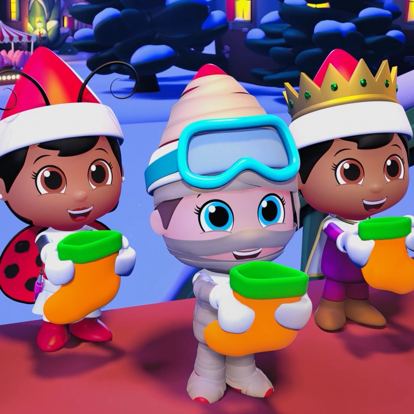 Scout Elf Squad elves hold orange and green stockings to go trick or treating