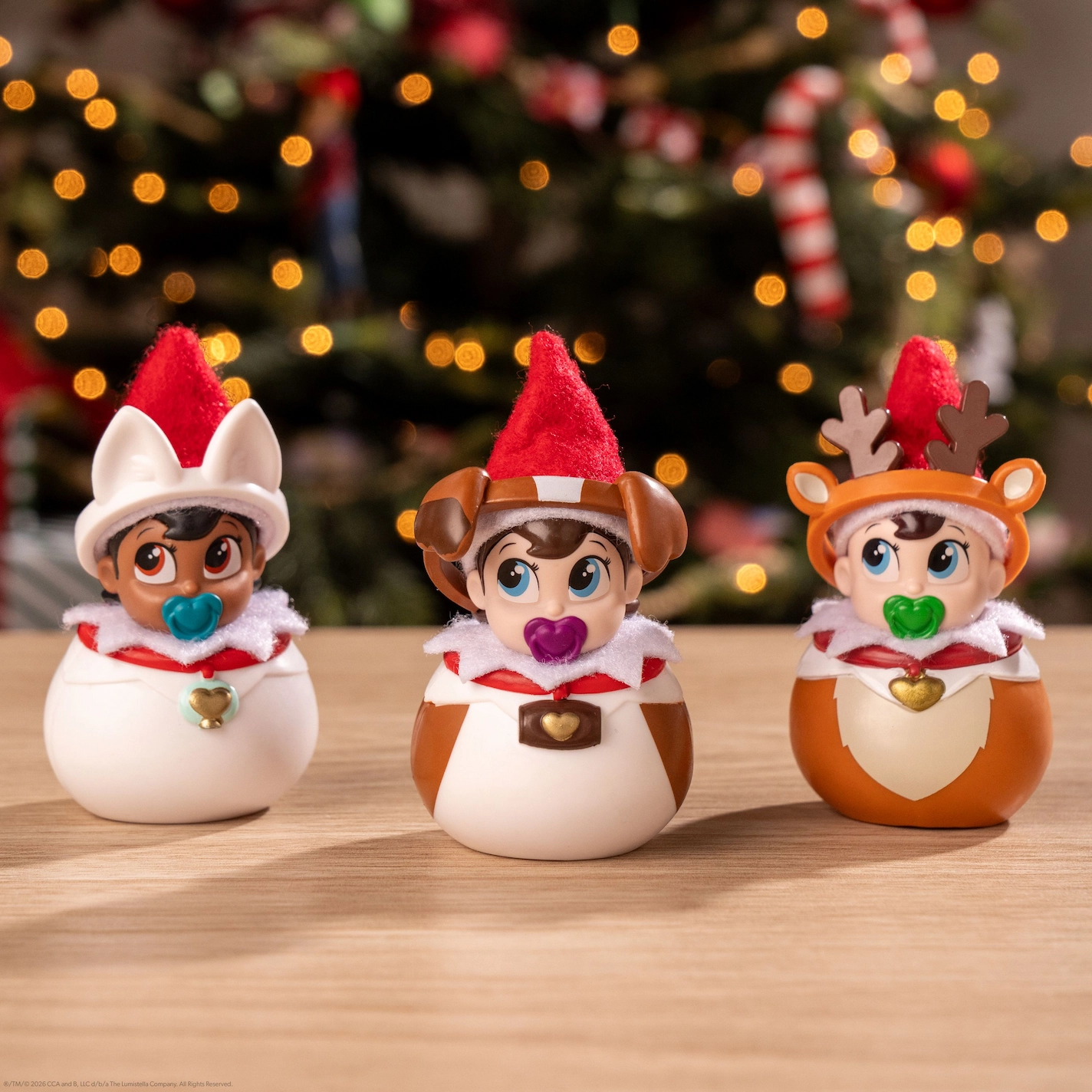 3 Frost Pips wear costumes that represent each of the Elf Pets, an arctic fox, a Saint Bernard pup and a miniature reindeer