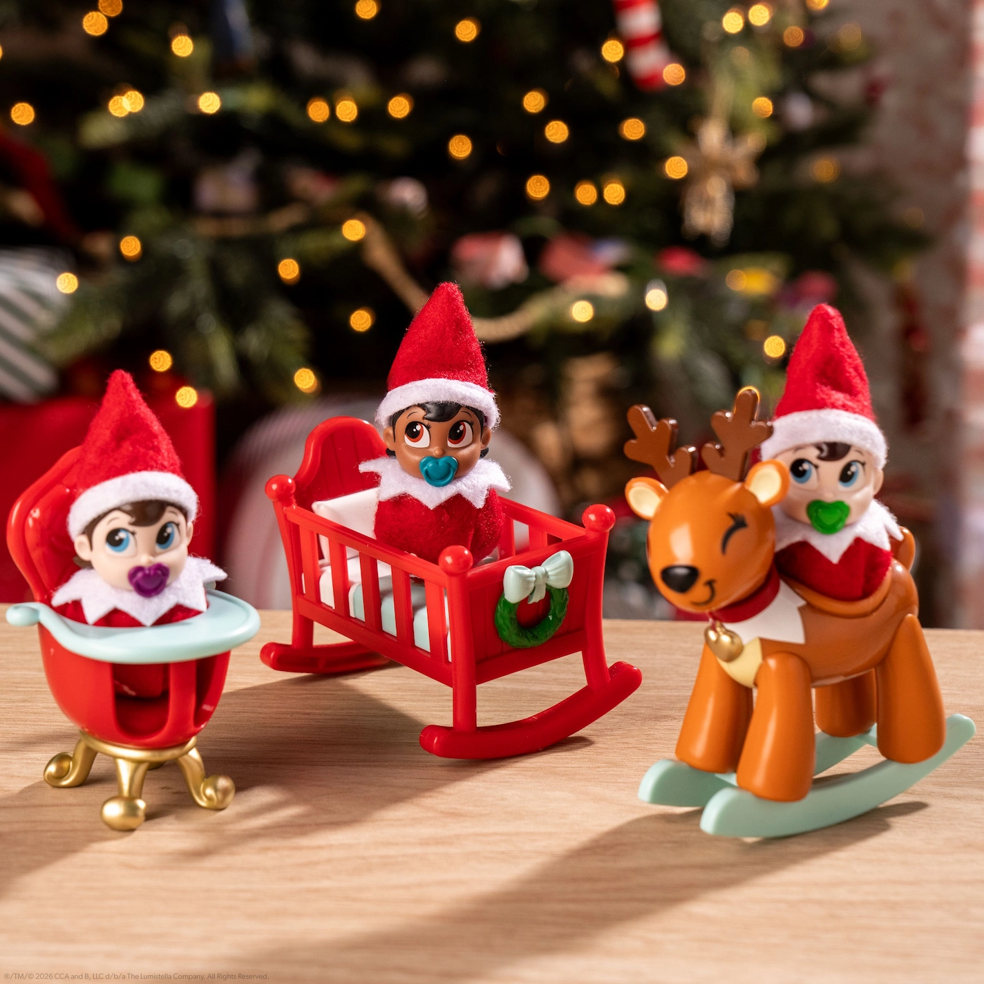 A high chair, crib and reindeer rocker playset for Frost Pips elf babies
