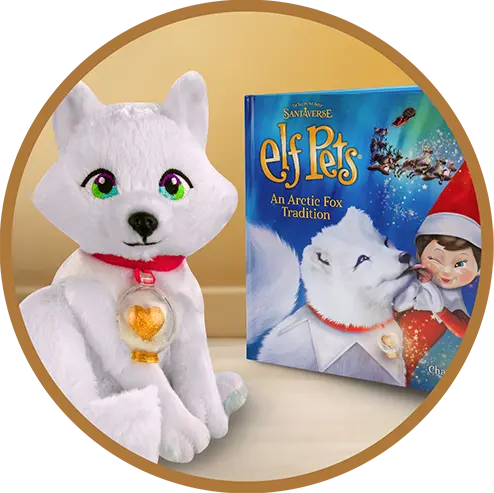 The Elf Pets Arctic Fox plush and book inside a gold circle