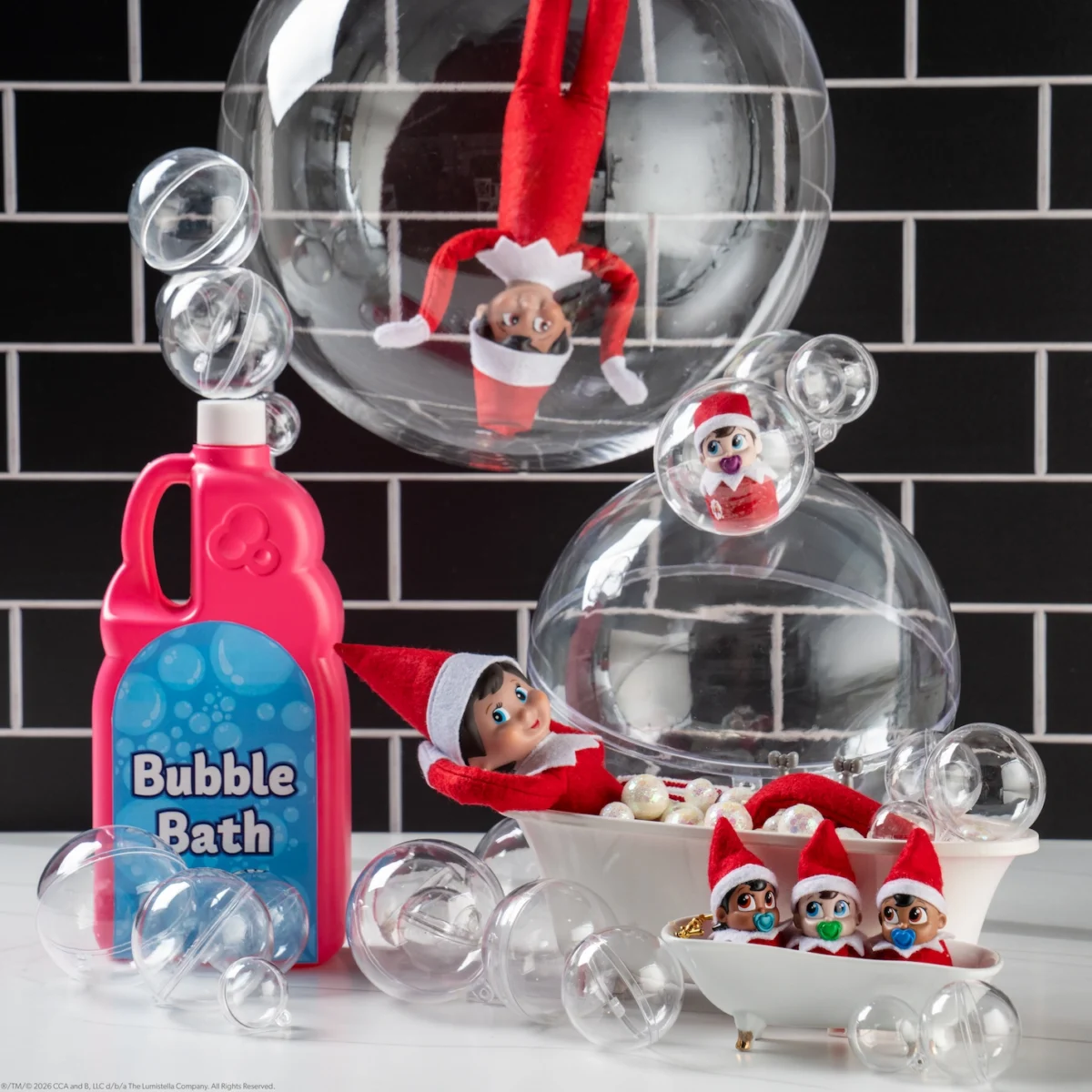 Three Frost Pips elf babies take a bubble bath while a two Scout Elves and giant bubbles float from the bath
