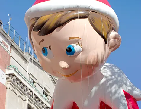 Close-up of the face of the Macy's Thanksgiving Day Parade Scout Elf balloon