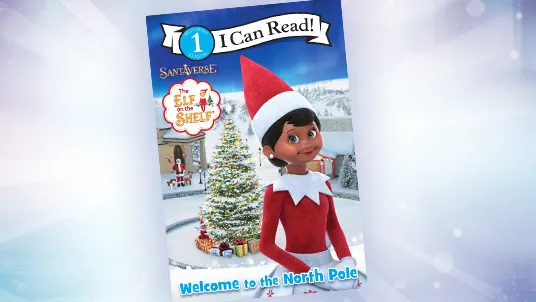 I Can Read! Welcome to the North Pole Book Cover. The cover features an 3D animated girl Scout Elf. In the background is the City Center with a large Christmas tree, buildings, as well as Santa, the Elf Pets Saint Bernard Reindeer, and several Scout Elves.