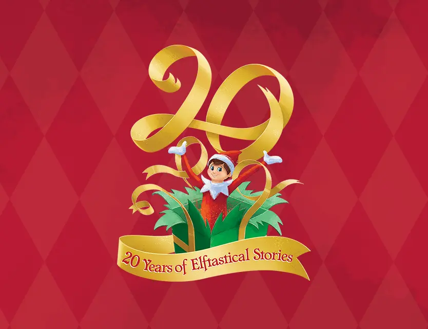 The 20th Anniversary logo centered on a red diamond pattern background. The logo has the number 20 spelled out in gold ribbon and a Scout Elf is sitting inside the 0. Underneath the 20 is another gold ribbon that says 20 Years of Elftastical Stories on it.