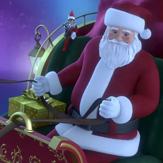 A close up of Santa Claus sitting in the front of his sleigh with the reins in his hands. Newsey the Elf is sitting on the seat by his shoulder holding her camera. Next to Santa on the green velvet seat of the sleigh is a gold present tied with gold ribbon. Behind Santa is his large red bag. The northern lights are in the sky.