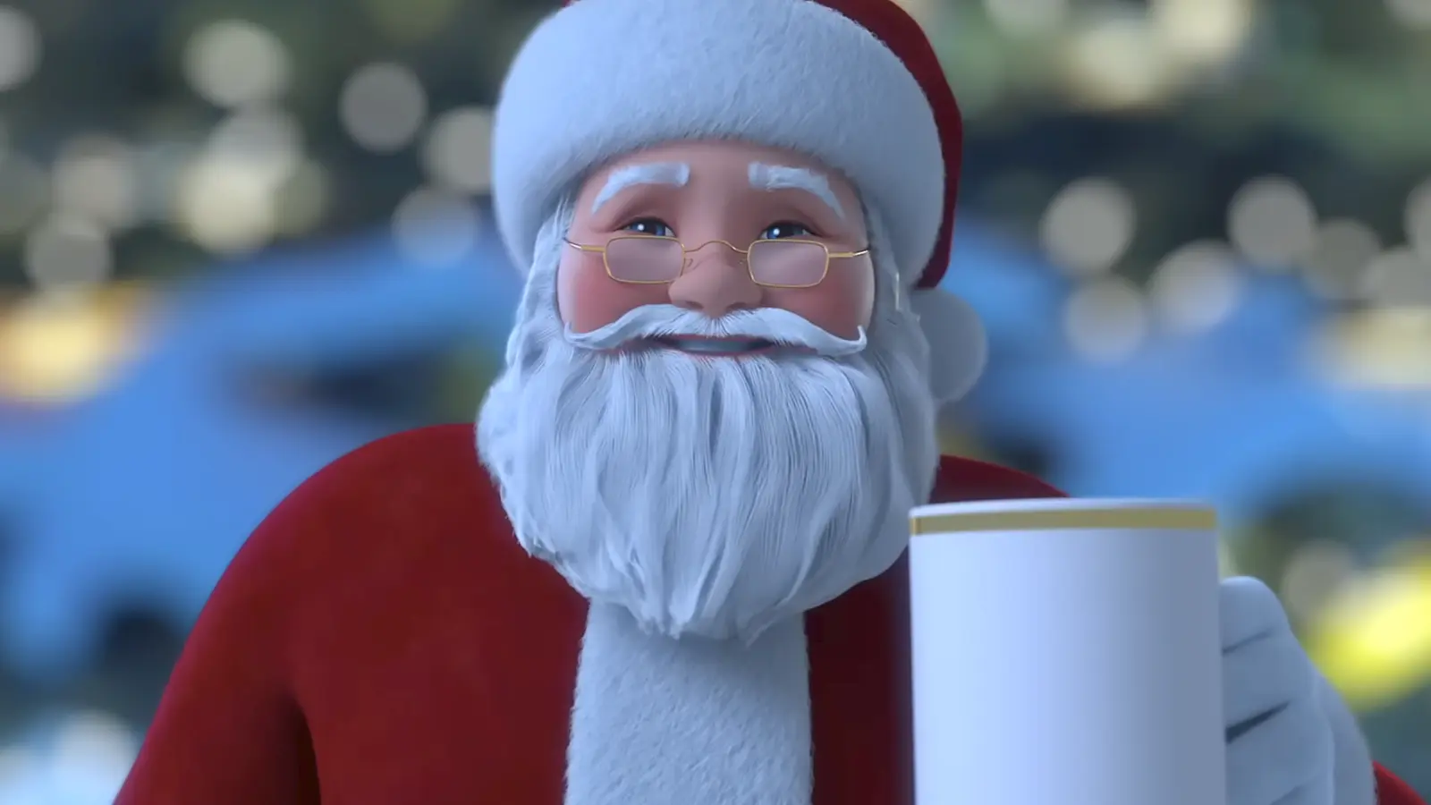 A smiling Santa Claus from the chest up holding a white mug with a gold stripe. He is on a blue, green, and yellow bokeh background.
