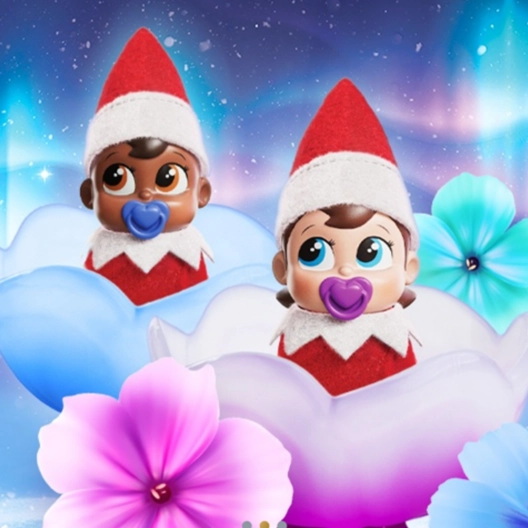Boy and girl frost pip products on a background of the northern lights, stars, and snowflakes. The boy is sitting in a blue frost flower with a blue pacifier, and the girl is sitting in a pink frost flower with a pink pacifier. Surrounding them are pink, blue, and turquoise frost blooms.