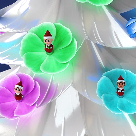 Boy and girl Frost Pips sitting within different colored frost blooms attached around the branches of a white, shimmery Christmas tree.