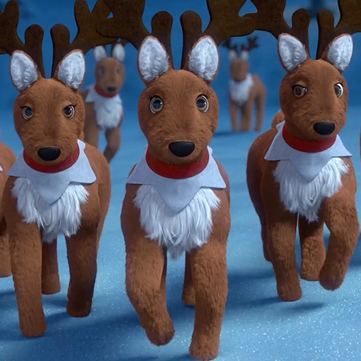 Five Elf Pets Reindeer marching through a field of snow. Three reindeer are up front and two others are behind them.
