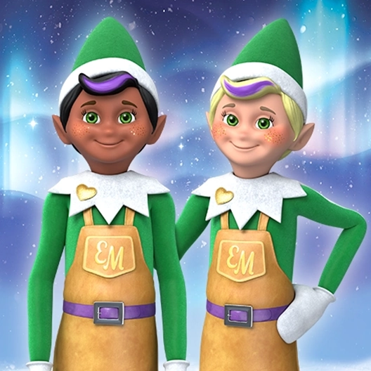 Two smiling toy makers standing side by side from the waist up looking forward. The elf on the right has his left hand on his hip and his left arm down at his side. The elf on the left has both arms at his side. The toy makers are overtop of a background featuring the northern lights and snowflakes.