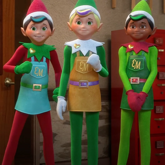 A Chef, Toy Maker, and Cobbler from the ankles up standing in a row next each other. They are in front of a tan wall with a wooden door on the left and a red metal filing cabinet to the right.
