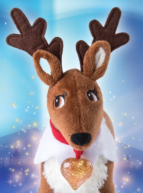 An Elf Pets Reindeer poses over a wintery, festive snowscape. He is surrounded by stars and light bursts.