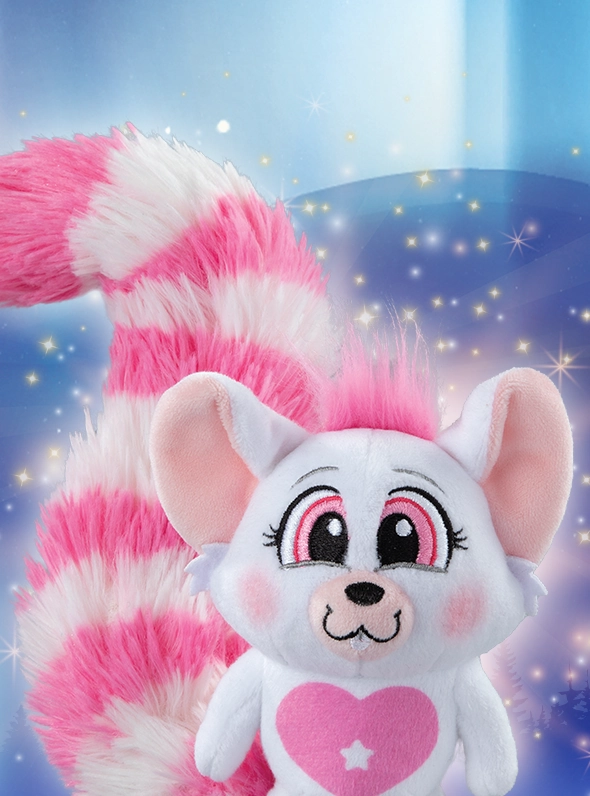 The pink Bogie poses over a wintery, festive snowscape. She is surrounded by stars and light bursts.