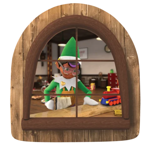 The Elf Mates Toy Maker saws wood to make a toy train