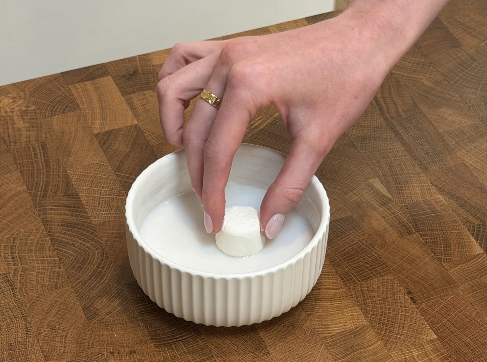 Marshmallow halves attached to chocolate biscuits