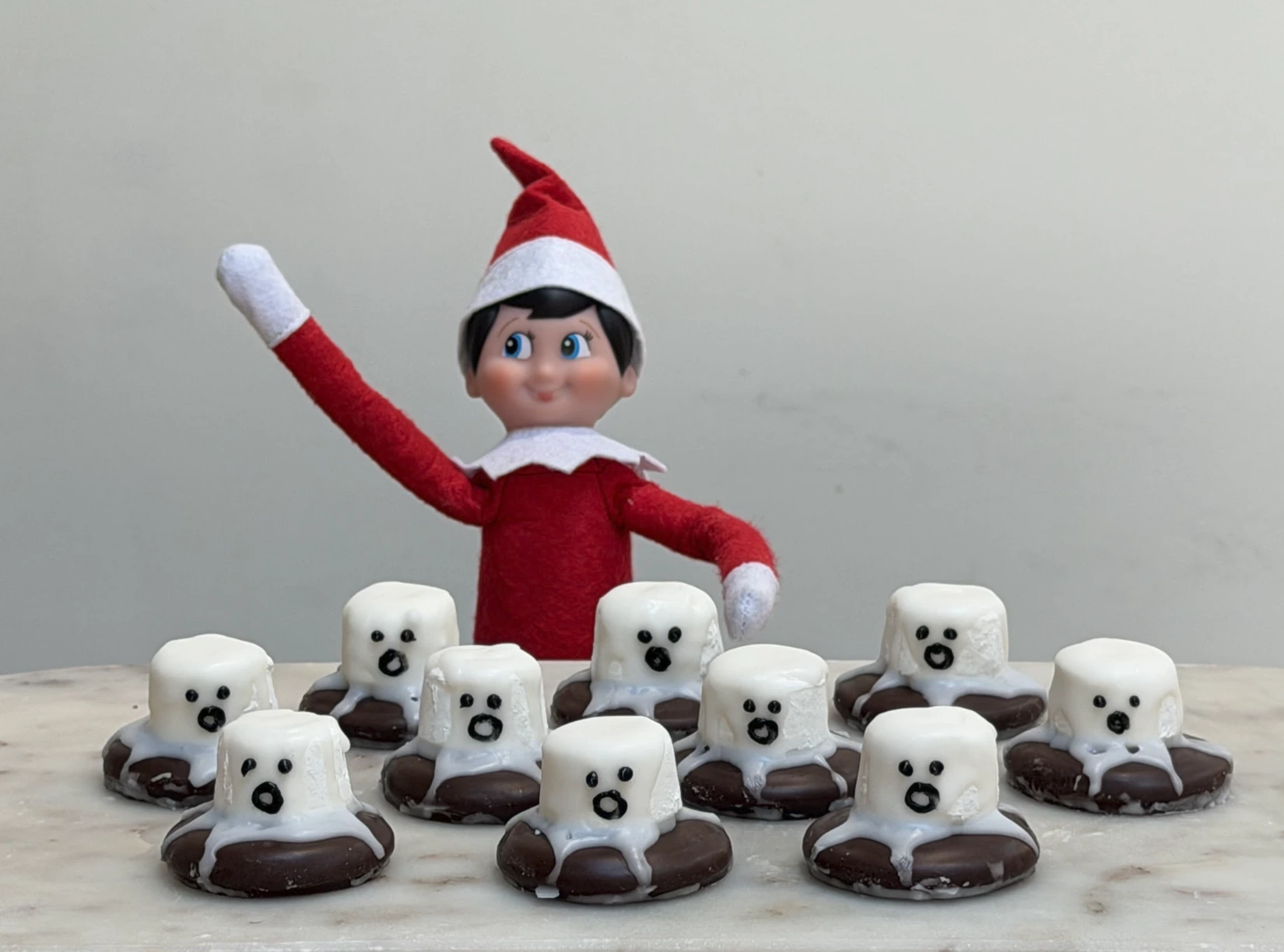 Ghost Choccy Biscuits being decorated