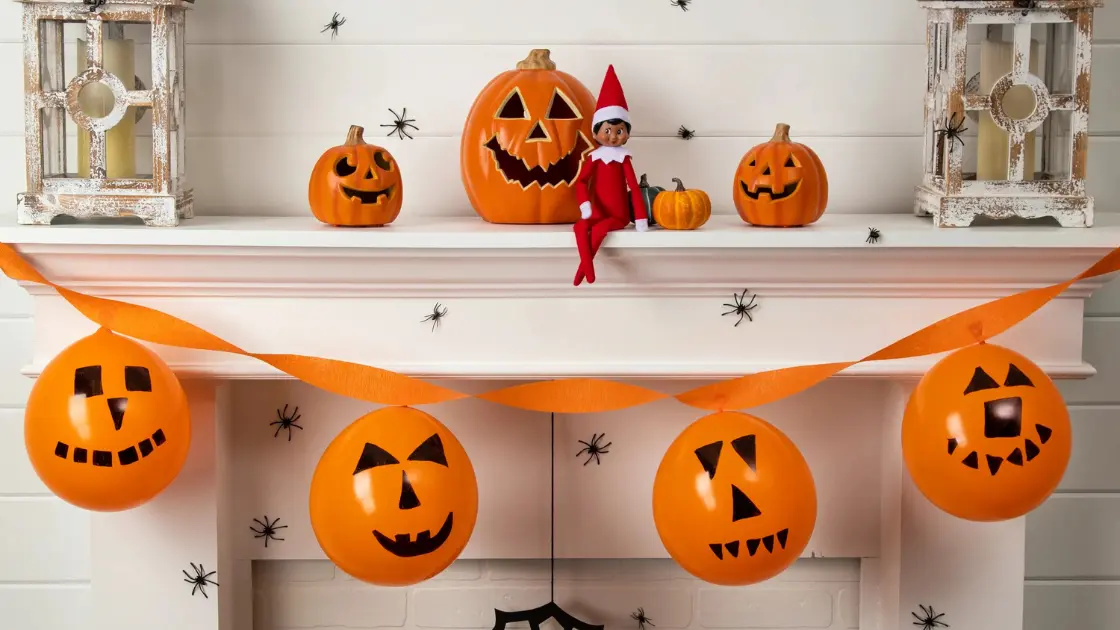 elf on the shelf with pumpkin decorations