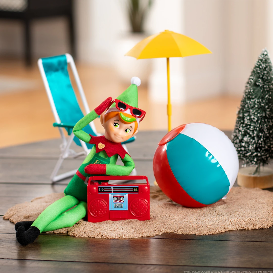 Elf Mates Cobbler staged on a beach with the Polar Props beach set