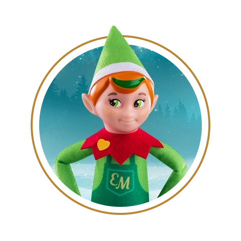 Elf Mates® Cobbler stands with his hands on his hips. He is framed in a circle with a wintery background as well as a golden stroke that also encloses him.